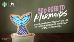 A photo from the Starbucks digital campaign, showing a mermaid tail shaped cookie with blue icing. The text reads '50p goes to Mermaids'